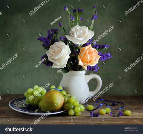 Beautiful Still Life With Roses And Fruit Stock Photo 98523911