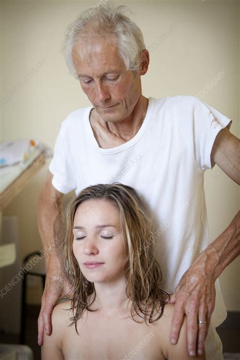 woman being massaged stock image c017 0949 science photo library