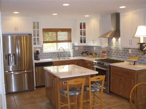 Black upper and white lower kitchen cabinets cupboard door materials modern kitchen cabinetry. Untitled Document www.frontiercabinets.com