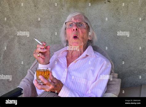 Old Lady Smoking Cigarette Hi Res Stock Photography And Images Alamy