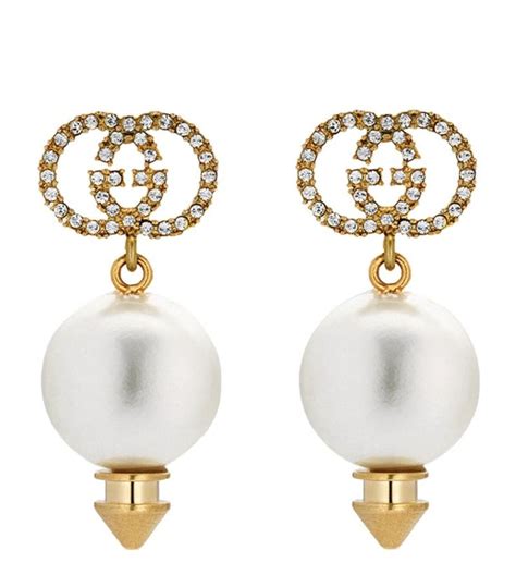 These Gucci Earrings Combine Statement Making Logo Detailing And