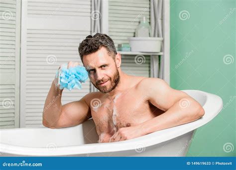 Pampering And Beauty Routine Handsome Muscular Man Relaxing Bathtub