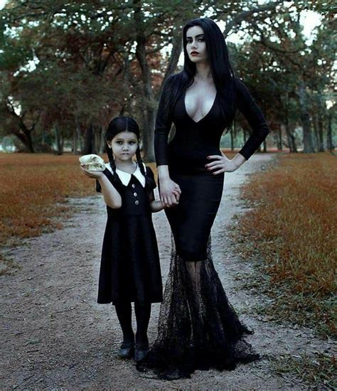 Get a little mysterious and spooky this halloween in this morticia addams costume for adults! Pin by Alia McBroon on My Favorites | Daughter halloween costumes, Couple halloween, Addams ...
