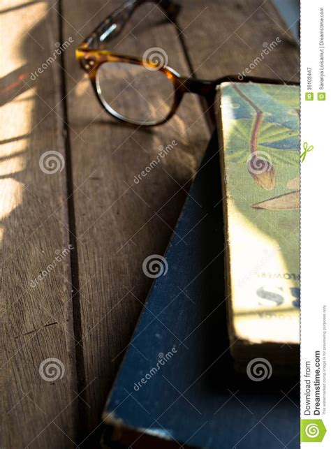 Eyeglasses And Vintage Old Books On Wooden Stock Image Image Of Cover