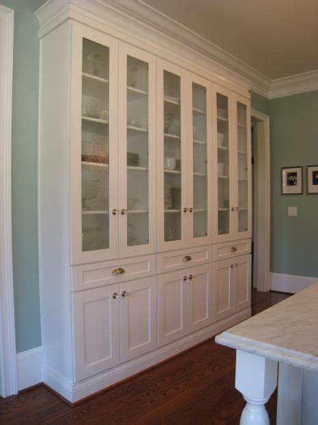 Unless we have the exact same room, the dimensions then, use a stud finder to find the studs on the wall where the cabinets will be installed. beautiful built in - with stock cabinets--look awesome on ...