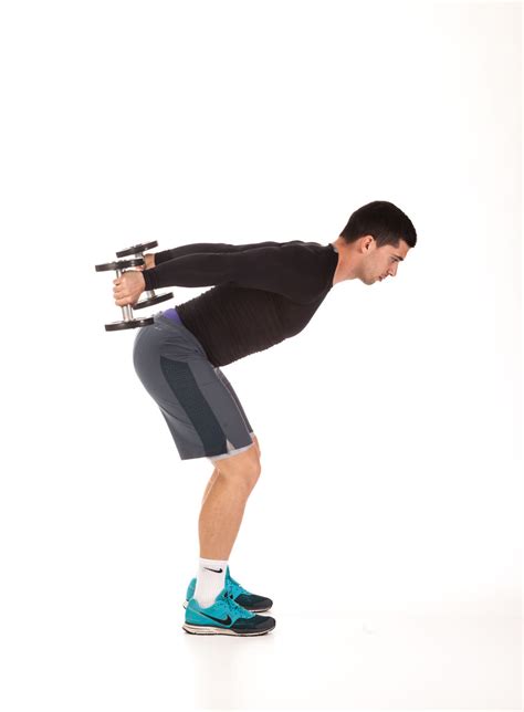 Standing overhead dumbbell tricep extension. Standing Bent-Over Two-Arm Dumbbell Triceps Extension ...