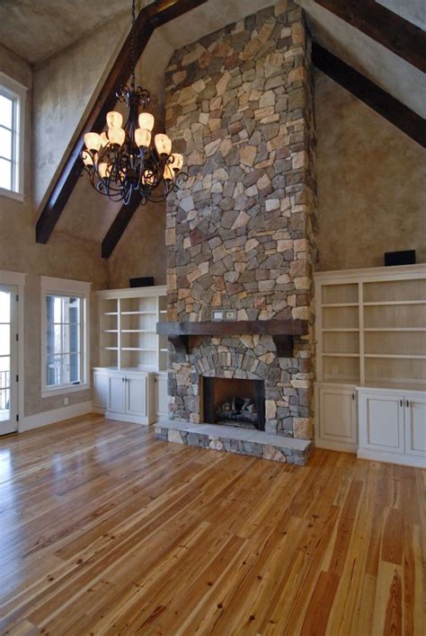 Beautiful Floor To Ceiling Stone Fireplace With Farmhouse Mantle