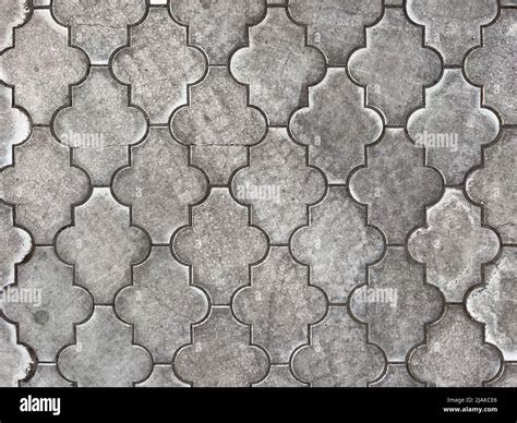Texture Of Interlocking Concrete Paving Blocks Top View Stock Photo