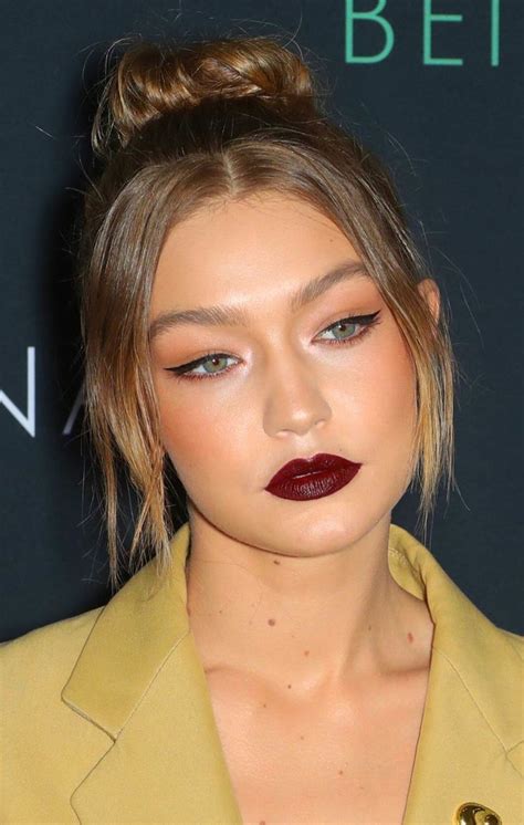 Gigi Hadid Wearing A Cat Eye Liner Makeup And Dark Red Lipstick In 2023
