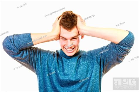 Closeup Stressed Man Holds Head With Hands Stock Photo Picture And
