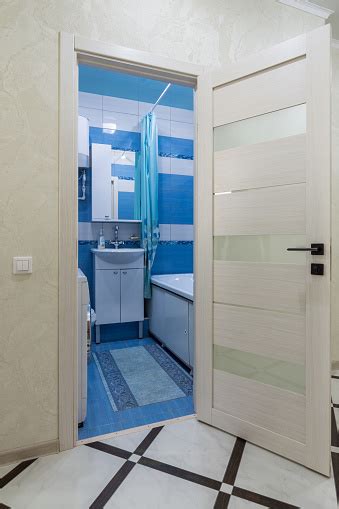 The Open Door To The Bathroom In The Interior Of The Apartment Stock