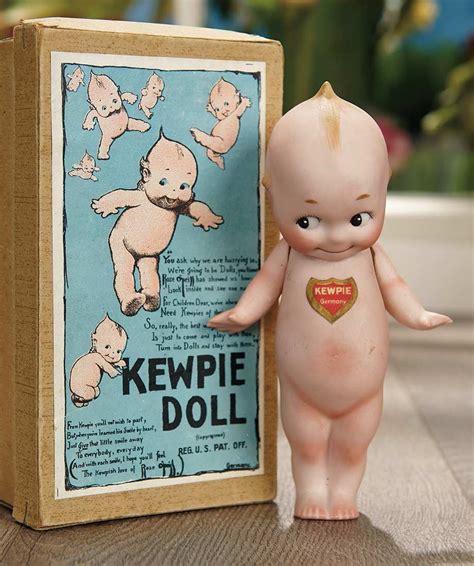 German Kewpie — 6 All Bisque Doll With Original Red Paper Kewpie