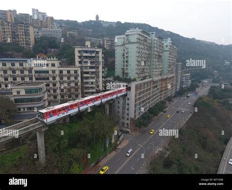 A Subway Train Of Chongqing Light Rail Line Arrives At The Liziba