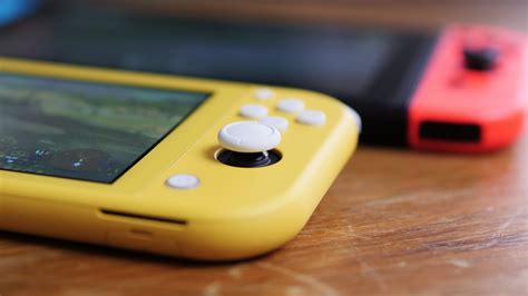 Comment Mettre Un Jeu Dans La Switch Lite - À peine lancée, la Nintendo Switch Lite est déjà touchée par le