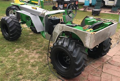 Pin By Randall Hearn On Lawn Mowers Mud Racing Mudding Monster Trucks