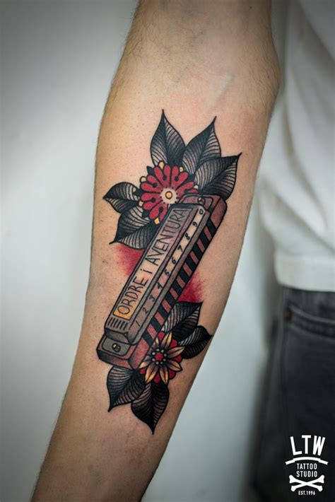 In fact, you really can't go wrong for instance, an upper arm tattoo may be hidden at work, with the option of letting your artwork go up. Harmonica Tattoos