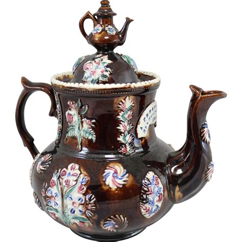 Перевод слова teapot, американское и британское произношение, транскрипция, словосочетания, примеры использования. English Measham Pottery Bargeware Teapot with Cover ...