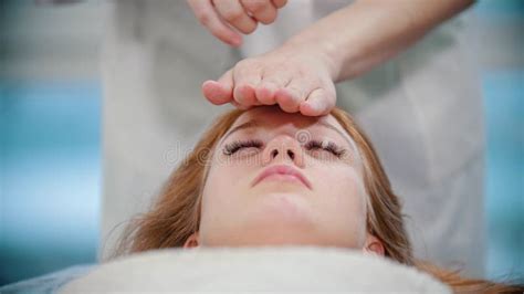 Massage Masseuse Is Kneading Her Clients Face With Palms Stock Image Image Of Lying