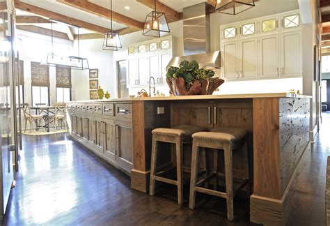 Maybe you would like to learn more about one of these? This kitchen features a pecky cypress island and painted ...