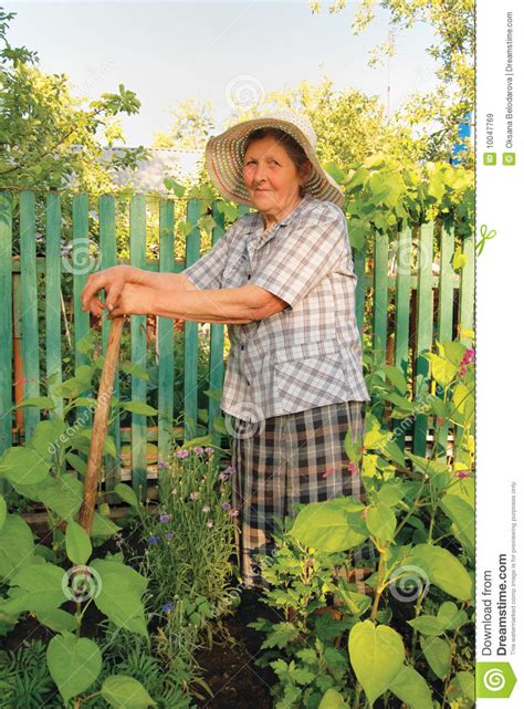 Old Woman Working In The Garden Stock Image Image Of