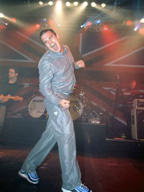 12 Throwback Robbie Williams Looks That Prove Hes A Low Key Fashion