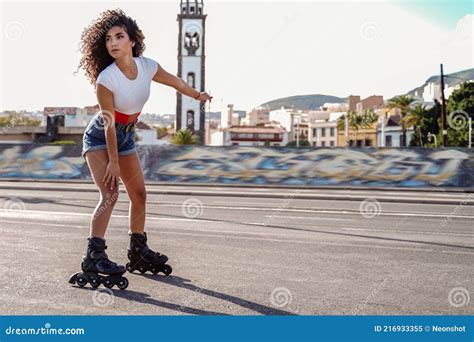 Cheerful Girl On Roller Skates Active And Healthy Lifestyle Concept