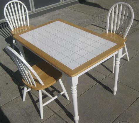 I want different chairs, and maybe a different table. Tile Top Kitchen Table Redo