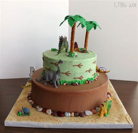 Cover the entire cake in icing, gently remove wax paper strips and then start decorating to make the dino cake. Pin on Cake Ideas: Birthday and otherwise