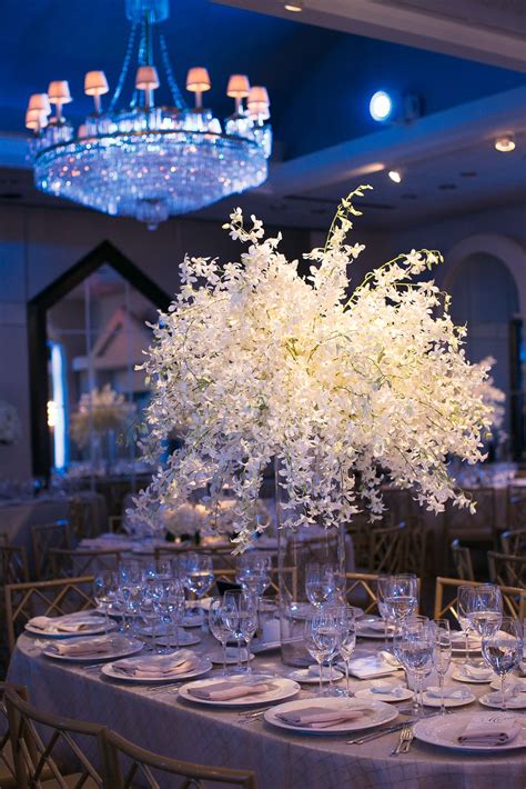 Large White Floral Centerpiece In Glass Vase Floral Centerpieces Wedding Vases White Floral