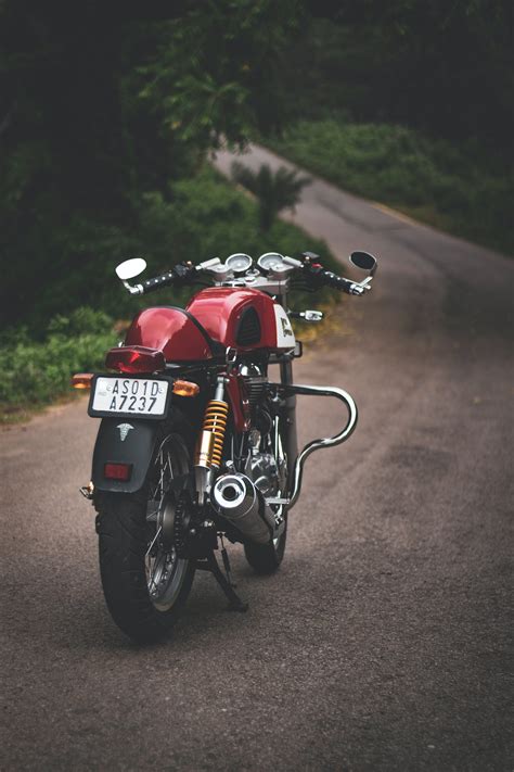 Photo Of Motorcycle Parked On Road · Free Stock Photo