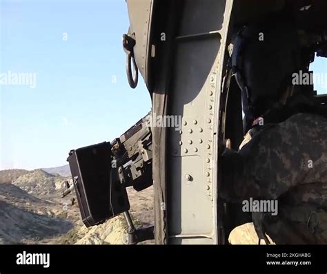 Door Gunner Firing M240b Machine Gun From Helicopter Stock Video