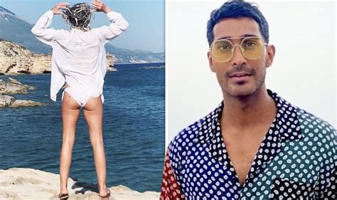 a place in the sun s danni menzies flashes bum in cheeky pic and new host lee approves