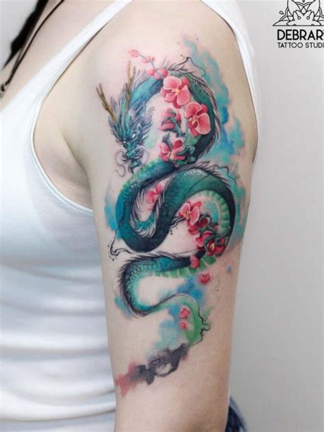 Tribal dragon feminine tattoo on back. Tattoo uploaded by Lexie DeWitt | Feminine dragon tattoo ...