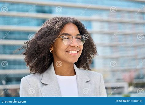 Smiling Young African American Business Woman Wearing Eyeglasses