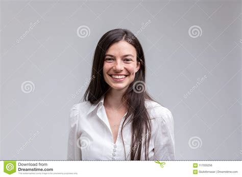 Young Long Haired Smiling Woman In White Shirt Stock Photo Image Of