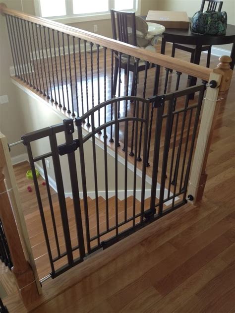 When installing your baby gate at the top of the stairs you need to be aware of the impact that wear and tear over time could have on the security of the fence. Split level house...baby proof stairs??? | Banister baby ...