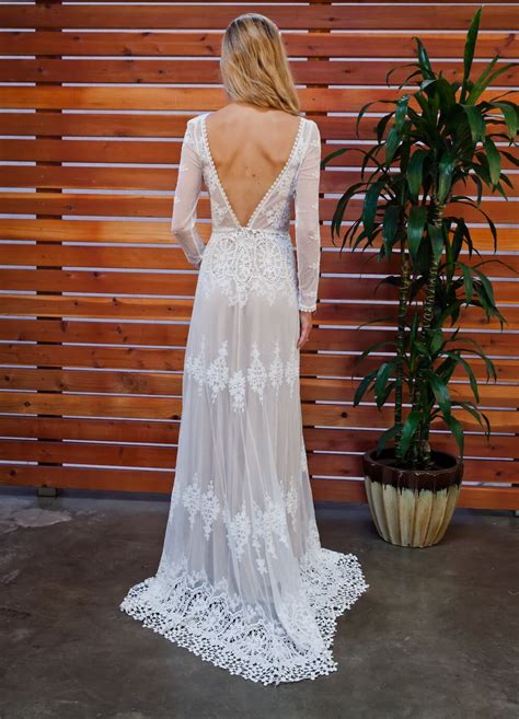 Delicate lace, flower crowns and tiny volume fabrics are for courteous and civil lovely wedding. Lisa Lace Backless Boho Wedding Dress | Dreamers and Lovers