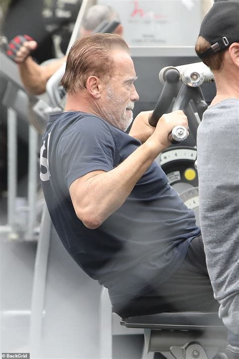 Arnold Schwarzenegger And Joseph Baena Lift Weights Together At Famous