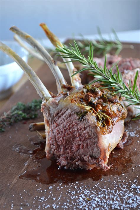 roasted rack of lamb with dijon mustard and fresh herbs sage to silver