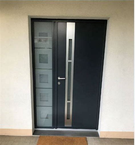 Porte d'entrée à ouvrant monobloc isolant de 72 mm d'épaisseur (collections perspective, caractère, contemporaine des portes d'entrée + personnalisées. Photothèque des réalisations WILCO