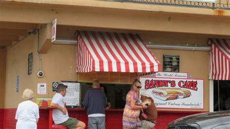 Some say they have the best shrimp tacos in all of key west. Sandy's Cafe produces a trademark lawsuit over who owns ...
