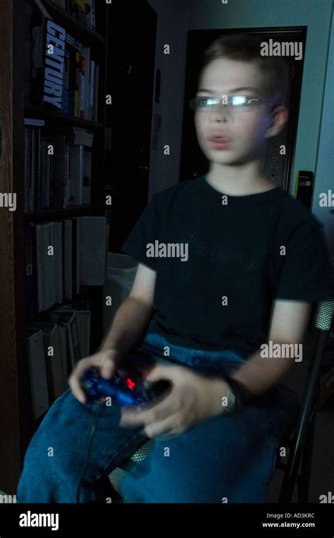 A Young Boy Playing Video Games Stock Photo Alamy
