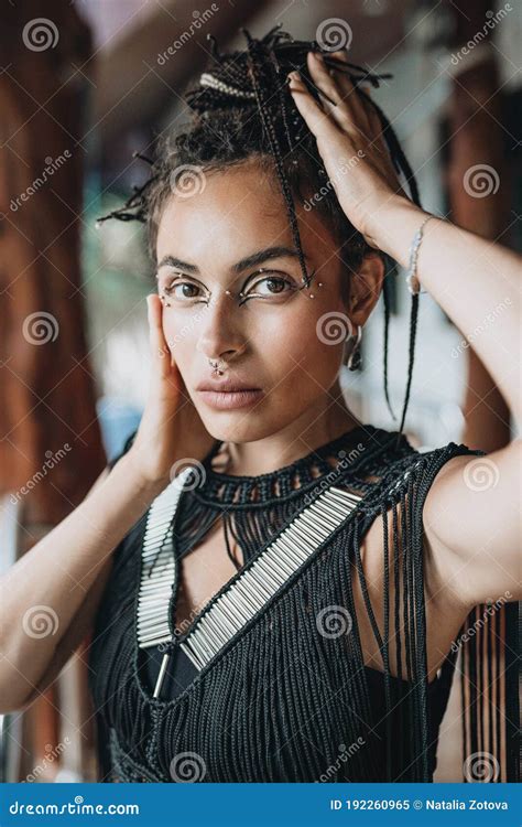 woman with braids in egyotian style posing at the beach stock image image of dreadlocks