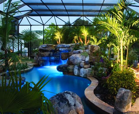 Natural Lagoon Pool With Spa Stream And Outdoor Kitchen