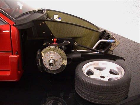 It is an unassembled red ferrari enzo, a primarily plastic model kit, as part of its 1/12 big scale racing car series. VWVortex.com - 1:12 Tamiya Ferrari Enzo