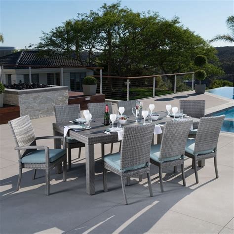 Composite wood outdoor dining table. Shop RST Brands Cannes 9-Piece Composite Patio Dining Set ...
