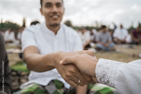 Young Man Shake Hand Each Other Forgiving Tradition Of Indonesian