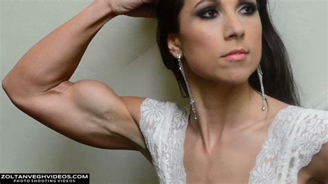 Muscle Girls Videos Store Fitness Model Flexing Biceps