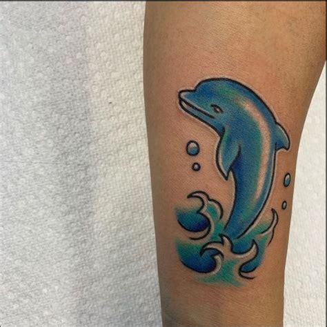 This tattoo will include a printable color reference that can be adjusted, and perfect matching stencil. Dolphin Tattoos - Best Latest And Cool Tattoos Designs And Ideas