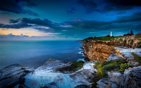 Lighthouse On Rocky Cliff Hd Wallpaper Background Image